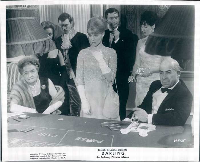 Julie Christie at baccarat table in Darling